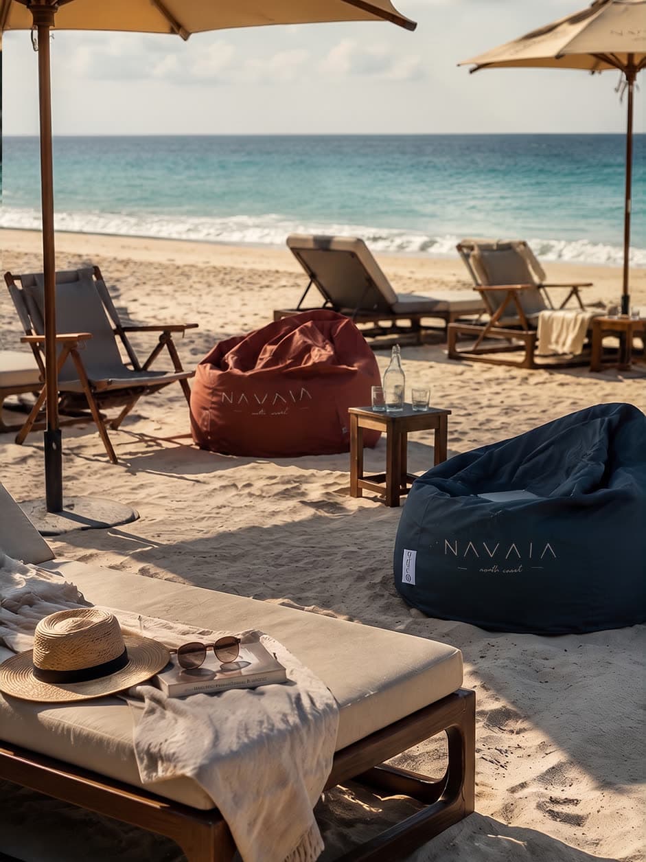Loungers and parasols on the sand at the beach club