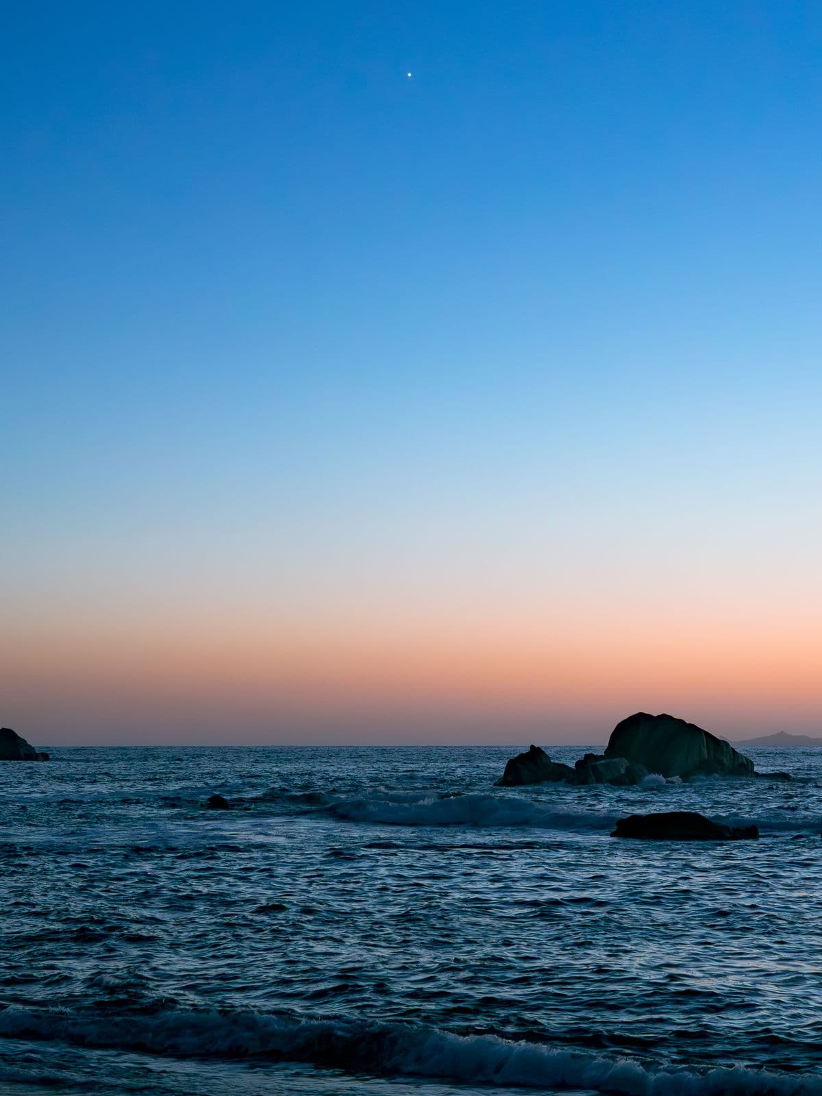The whole coast softens to gold